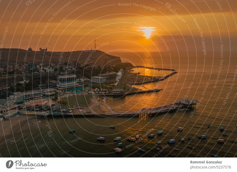 Aerial view sunset beach club in the district of Chorillos in Lima. Club Regatas. water evening trip sunny blue time agua dulce beach drone seascape popular