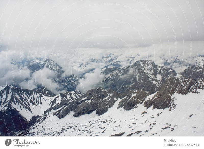 band of clouds Alps Mountain Snow Winter Landscape Clouds Peak Snowcapped peak Nature Sky Cold Panorama (View) Environment Far-off places cloudy weather Weather