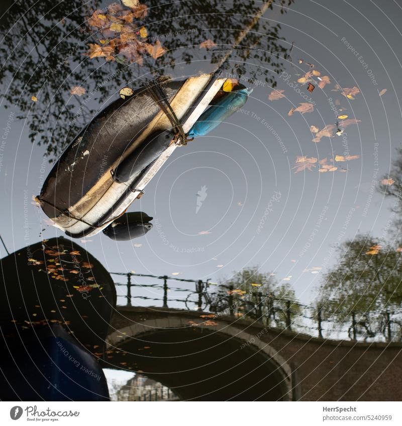 Sunk boat in Dutch canal wreck dropped perished Transience Gracht Netherlands Amsterdam Water reflection Surface of water Channel Building Bridge Bridge railing