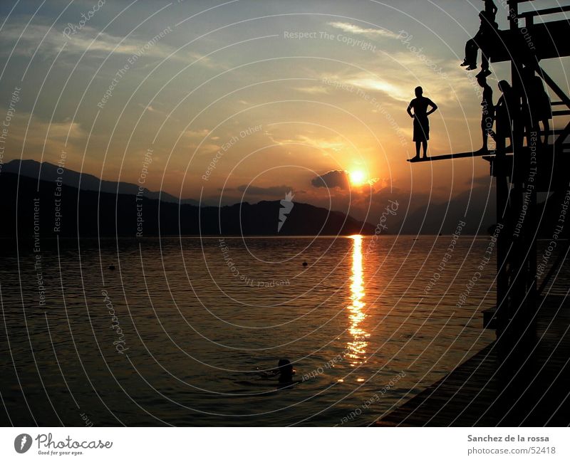 Jump in the deep end Federal State of Kärnten Lake Sunset Clouds Water Sky Mountain