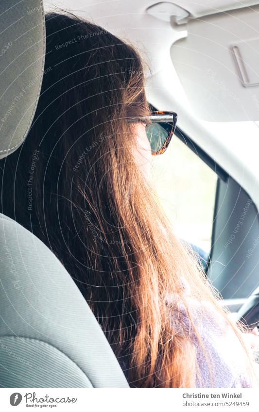 young driver Car driver Young woman Motoring Woman at the wheel Sunday outing holiday trip hair Sunglasses Means of transport Driving Vehicle Road traffic