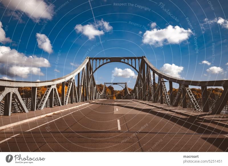 Potsdam- Glienicker Bridge Glienicke Bridge River Channel Steel architecture Construction Division east-west GDR Reunification Sky variegated forests trees