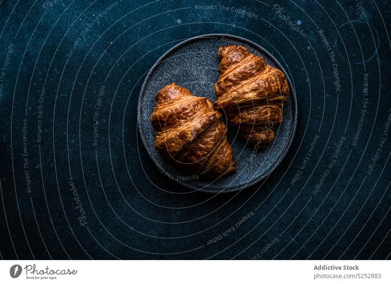 Fresh baked croissant with jam background concrete crunchy dessert eat eating food french meal napkin pastry plate sweet table delicious yummy tasty fresh