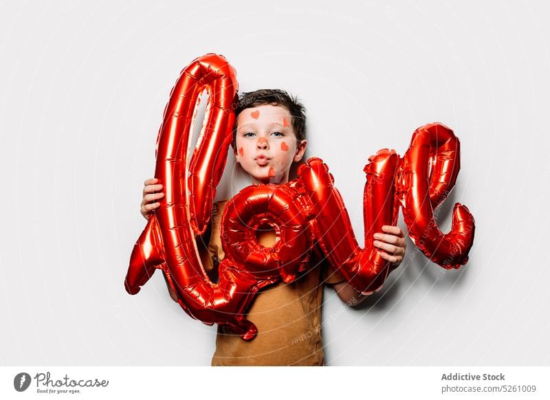 Boy with Love balloon pouting lips boy heart love saint valentine day celebrate kiss shape cute symbol adorable romantic decoration occasion holiday kid funny