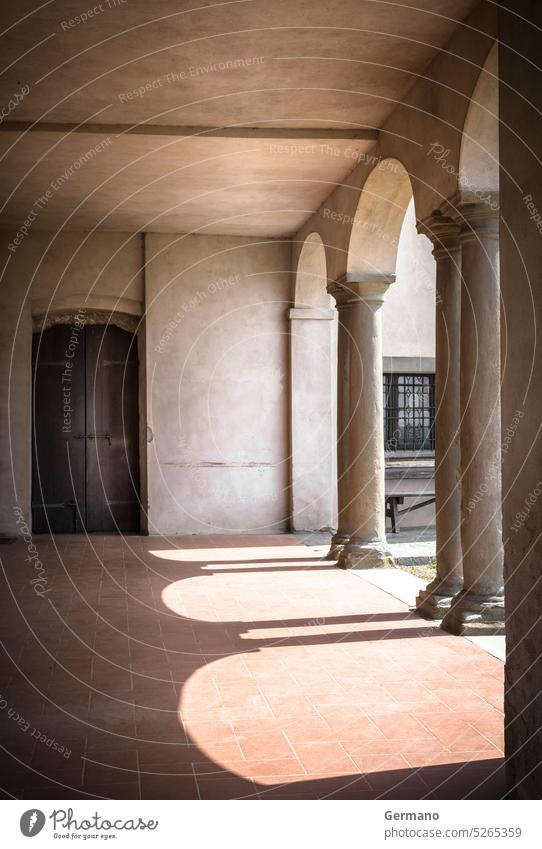 Cloister of an ancient church Europe Italy Outdoor arcade arch arched arches architecture building cathedral catholic christian cloister colonnade day gothic