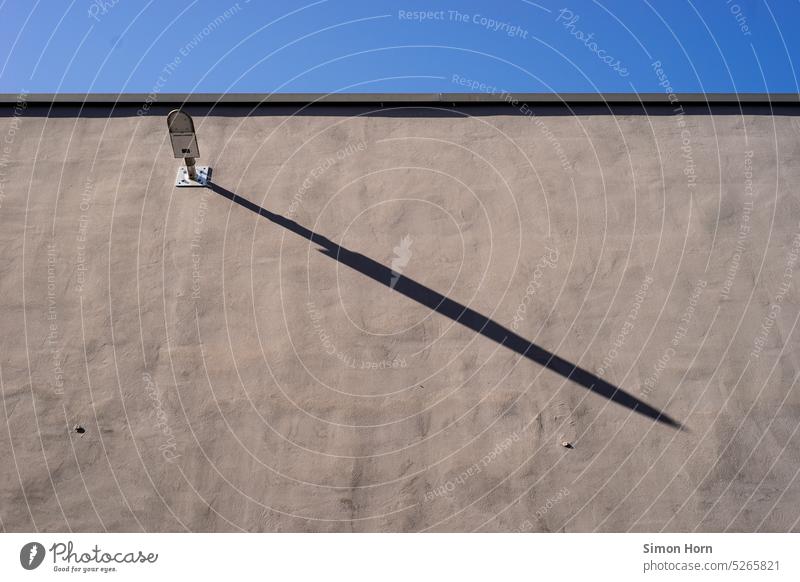 the shadows are getting longer Lamp Shadow Evening Sun Wall (building) shadow cast clock hands Sundial Structures and shapes Facade Contrast Light and shadow