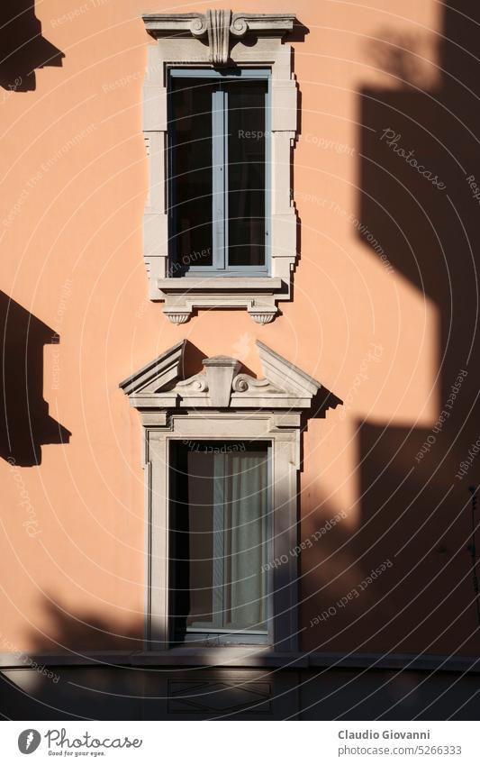 Old house along via Piero della Francesca in Milan Italy Lombardy architecture building city exterior facade historic old outdoor palace residential shadows