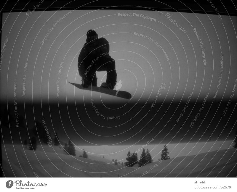 fs nosebone on monitor Snowboard Jump Screen Snowboarder Snowboarding Freestyle Winter Talented Stripe Dark Black & white photo Silhouette Experimental Reaction