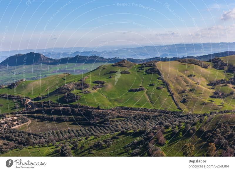 Landscape of valley and fields in Morgantina scenery hill italian rural scenic italy sicily aidone enna morgantina island southern wild wildfire central