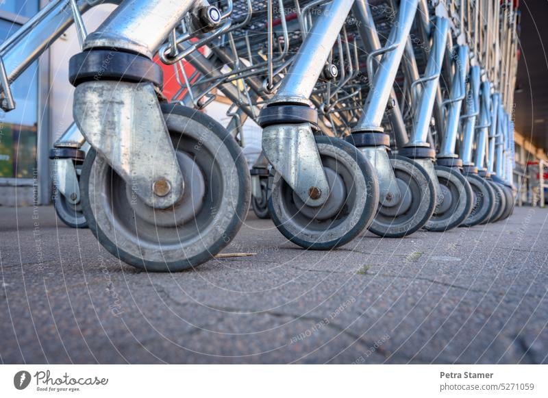 Shopping cart wheel Shopping Trolley Shopping cart wheels Consumption Trade consumer Commerce Wheel Deserted Hypermarket Supermarket