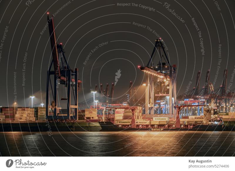 Container gantry cranes on the Elbe container port evening hour clearer aperture stars Night shot technique Cargo industry Container storage deposit freight