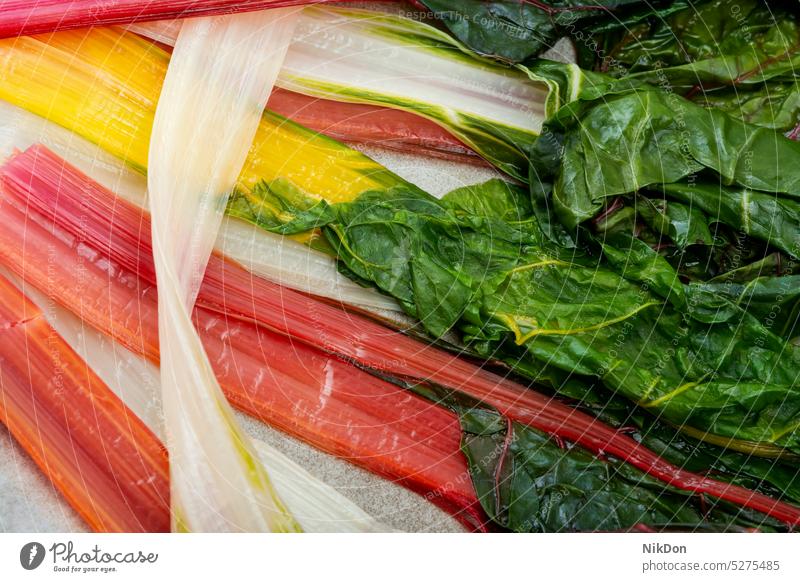 Stir-fried chard on a plate. sauteed leaf vegetable leafy swiss chard mangold green healthy food food background close up macro organic vegetarian nutrition