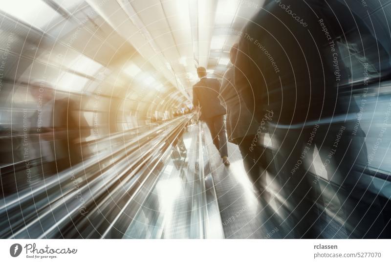 Blurred business traveler on a indoor walkway architecture visitors moving hannover corridor frankfurt people trade fair dusseldorf cologne blur messe