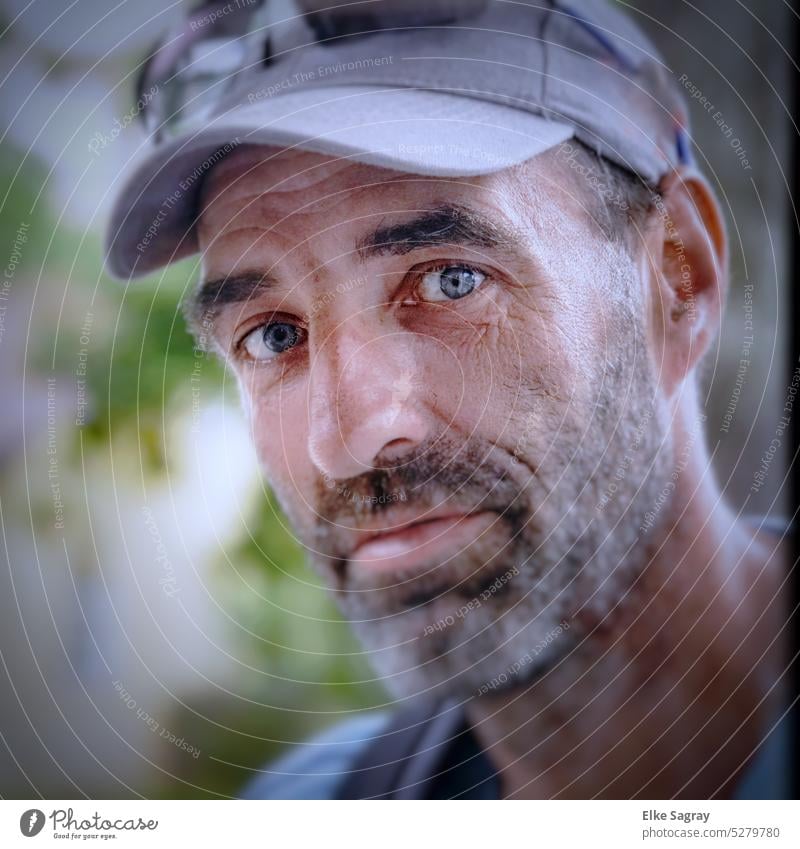 Irresistible young man looks at camera portrait Human being Face Man Masculine Adults Shallow depth of field Facial hair Colour photo Exterior shot