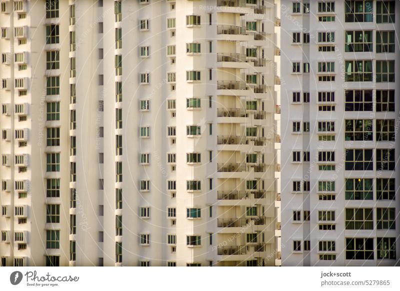 living for all with corners and edges Facade Modern architecture Tower block Symmetry Window Structures and shapes Authentic Many dreariness Sharp-edged