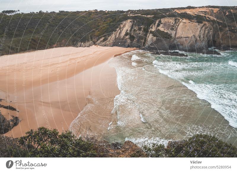 Rugged, unique rock and cliff coastline on the Atlantic Ocean in the west of Portugal in the famous tourist region of the Algarve. In the footsteps of the Fisherman Trail