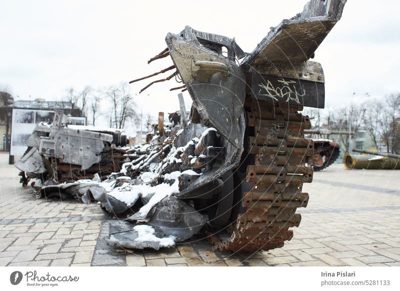 Kyiv, Ukraine - 03.29.2023: Civilian car shot by Russian soldiers. War in Ukraine. Destroyed russian tank on the Mykhailivs'ka Square. accident aggression