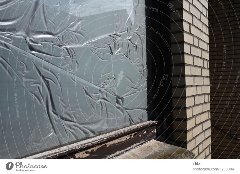 Glued window of an abandoned factory Window Facade Windowsill bricks Wood protective film Covers (Construction) House (Residential Structure) Exterior shot