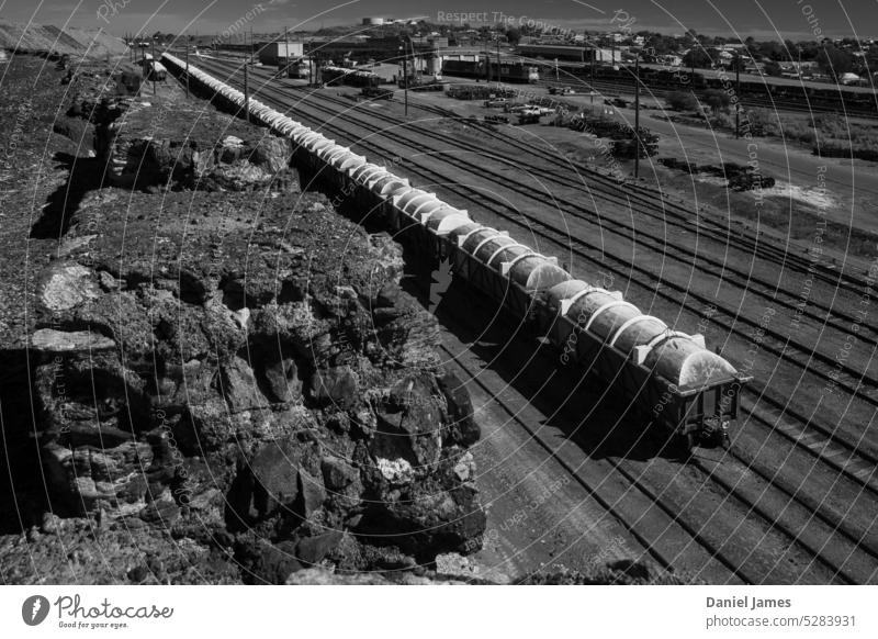 Long freight train in the Australian outback, going nowhere Train Freight train train tracks railway Railroad tracks Rail transport Transport Logistics