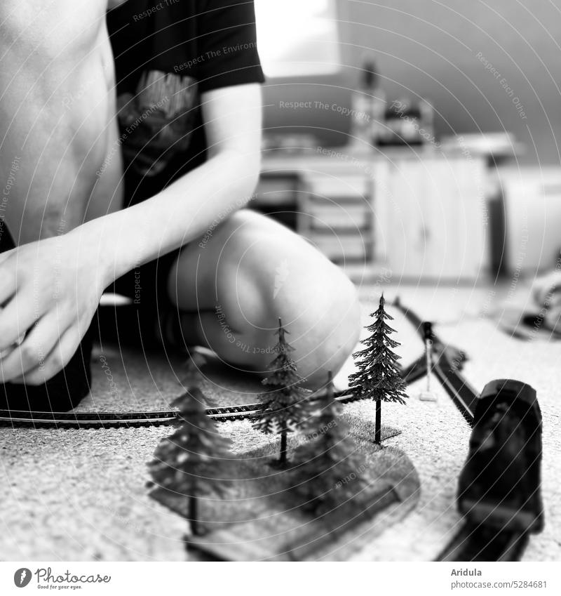 Child playing with model train b/w Model railroad Playing Toys Track width H0 Model-making Leisure and hobbies Infancy Childhood memory Children's room firs