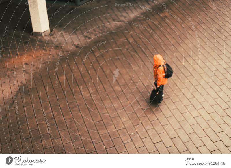 On the way to... Going Human being from on high Bird's-eye view Orange Rain Rain jacket Luggage Backpack Bag Carrying path of life Direction Target