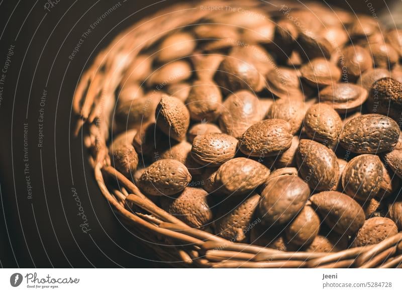 Many almonds in one basket Almond Food Nutrition Fruit Basket Markets safekeeping Healthy Vegetarian diet Food photograph