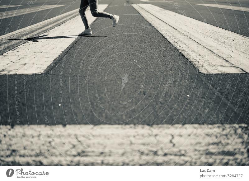 Ready to take off - out of the way! runway Runway Zebra crossing Walking Running ready to go Ready to start Airport Airfield Legs Transport Asphalt Gray person