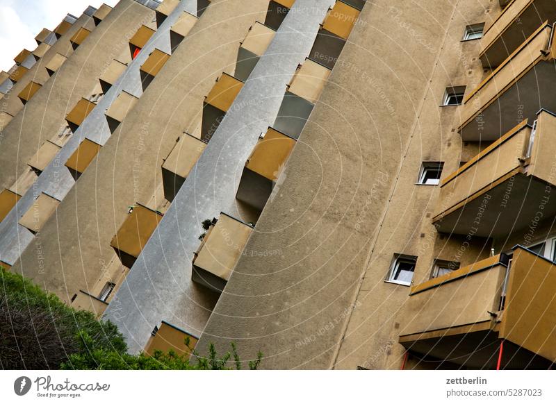 apartment block, new construction, facade, balconies on the outside Fire wall Facade Window House (Residential Structure) Sky Sky blue rear building Backyard