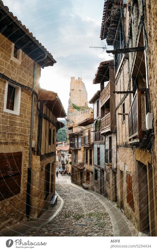 Street of Frias with the castle at the background, Burgos, Spain village street medieval landmark town tourism destination narrow travel heritage famous