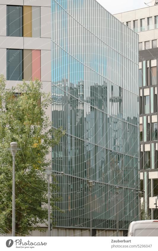 Modern glass facade with reflection of opposite buildings in the big city Facade Glas facade Town City urban Arch Architecture Reflection Building Glass