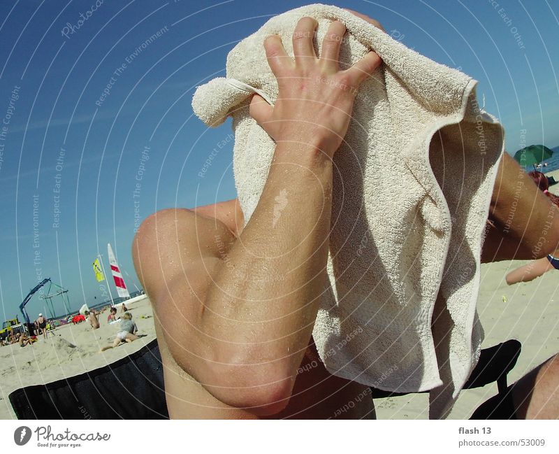 hidden face Towel Man Ocean Exterior shot Baltic Sea Goverland lazy Joy hair drying mysterious face long nose short nose beautiful eyes