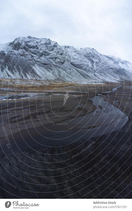 River and wetlands in snowy valley mountain river winter nature ice cold iceland environment landscape frozen frost scenery weather season estuary wintertime