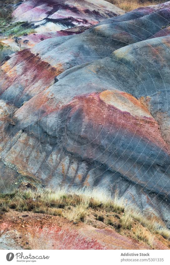 Canyon with rocky formations and plants nature mountain background grass hill scenery highland landscape environment picturesque colorful bright daylight valley