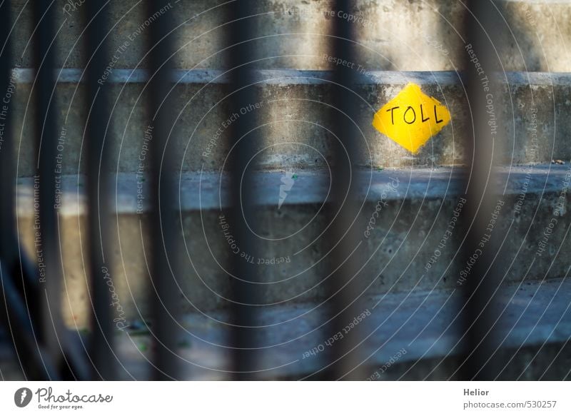 Great behind bars. Town Downtown Stairs Pedestrian Lanes & trails Concrete Metal Steel Signs and labeling Yellow Gray Banister Go up Road marking Colour photo