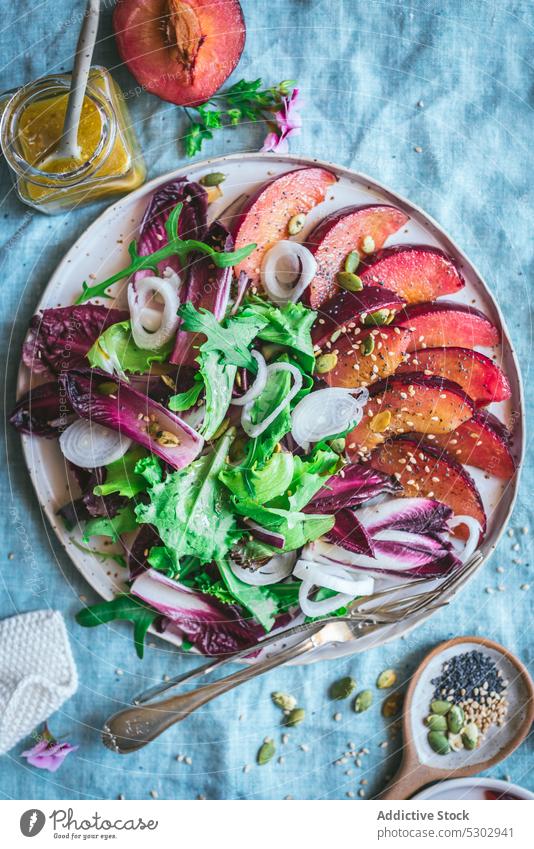 Delicious salad with vegetables grilled plum endive assorted healthy spice delicious plate tasty meal ingredient fresh food nutrition various yummy organic