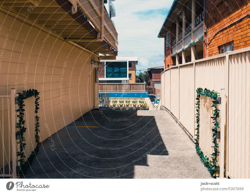 Comparison | of vertical surfaces and shapes of a driveway Parking area Metalware Deserted Fence House (Residential Structure) Highway ramp (entrance) Gloomy