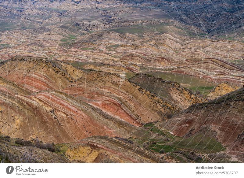 Colorful slopes in Garedja desert in Georgia Caucasus Gareja Kakheti Mravaltskaro adventure arid canyon color colorful destination dramatic dune geology georgia