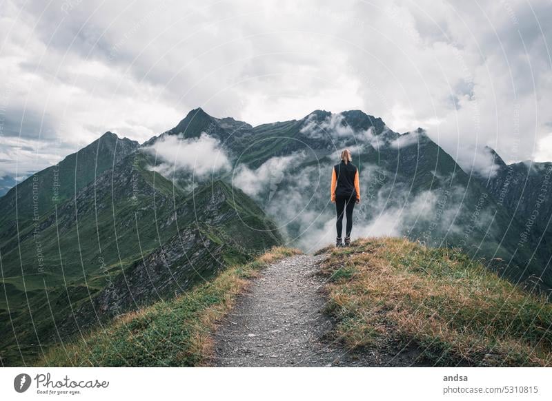 Hiker in the mountains hike Landscape Hiking Nature Adventure High mountain region Mountain Exterior shot Vacation & Travel Hiking trip Tourism wanderlust