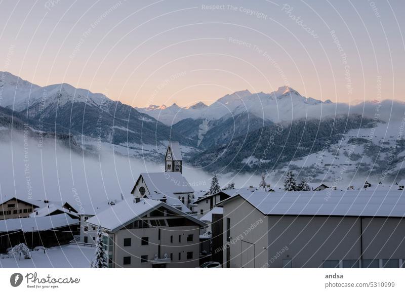 Snowy mountain village in sunrise and sea of fog Mountain village snowy Sunrise mountains Village Winter Alps Switzerland Peak Fog Sea of fog High fog Landscape