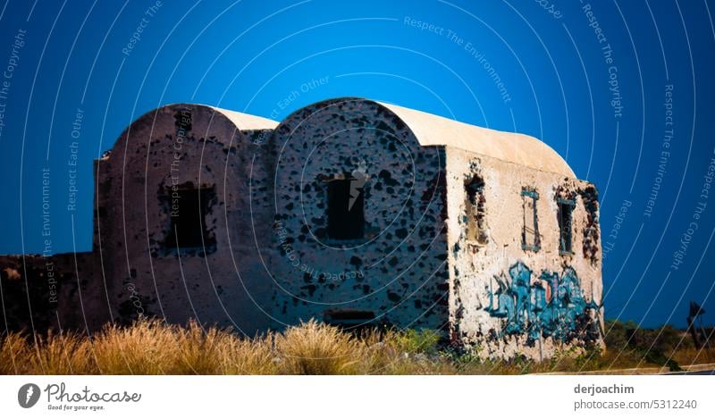 Abandoned houses in Santorini. row of houses Sky Sky blue Exterior shot Clear sky Beautiful weather Colour photo Blue sky Deserted Sunlight Cloudless sky Light