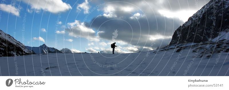 solitude Clouds Hiking Silhouette Loneliness Backpack Footprint Panorama (View) Sky Snow Mountain Rock Alps Chalk alps Tracks Freedom Large Panorama (Format)