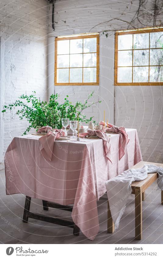 Dining table with napkin and bench tablecloth brick wall potted dishware plant flower creative fabric style pink window cute decor interior wooden tableware