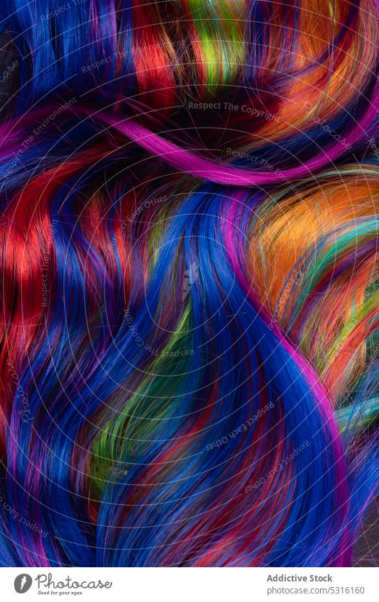 Background of vivid colored hair multicolored curl background style colorful dyed vogue fashion rainbow trendy minimalist spectrum vibrant soft lock texture