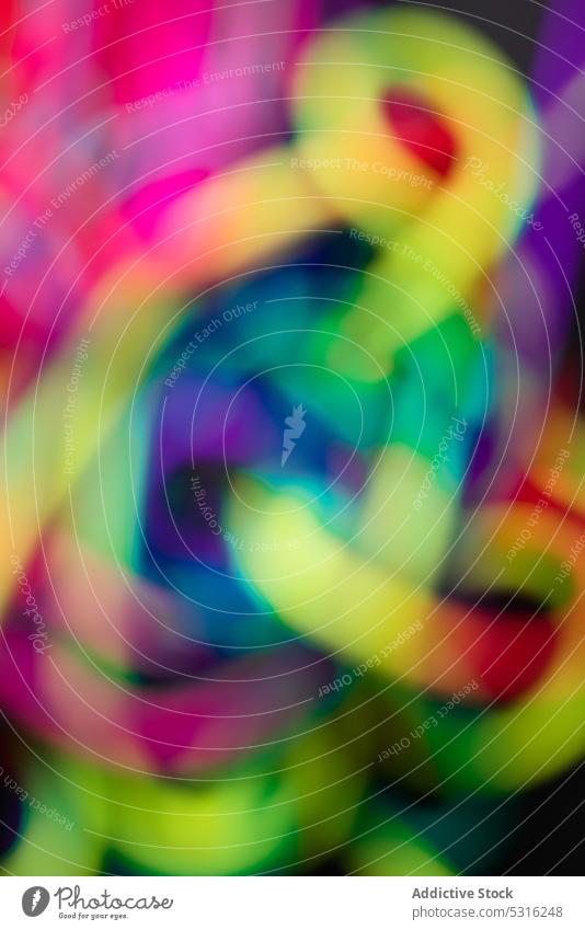 Blurred multicolored lines in background vibrant blur abstract creative spectrum bright design style colorful art mess decoration element twine glow vivid loose