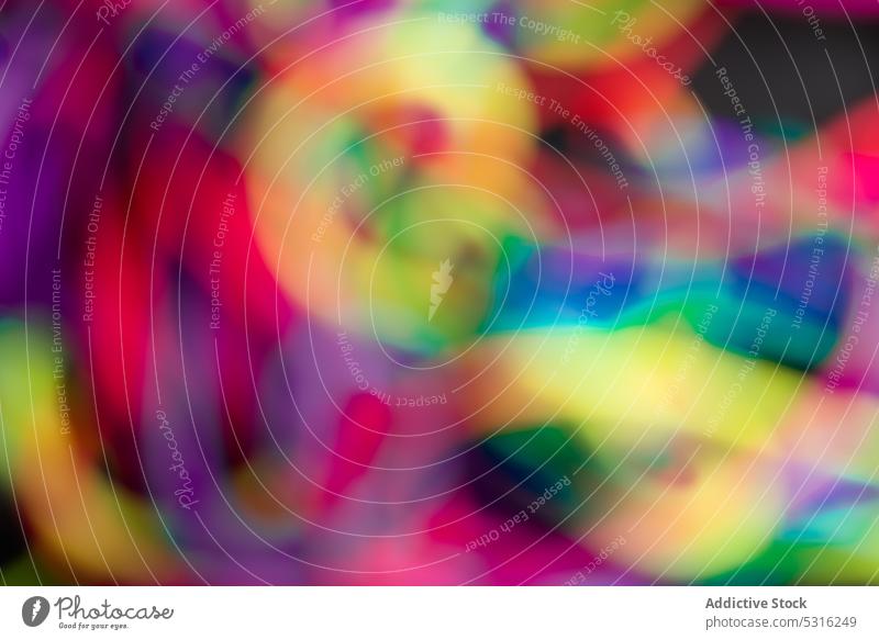 Blurred multicolored lines in background vibrant blur abstract creative spectrum bright design style colorful art mess decoration element twine glow vivid loose