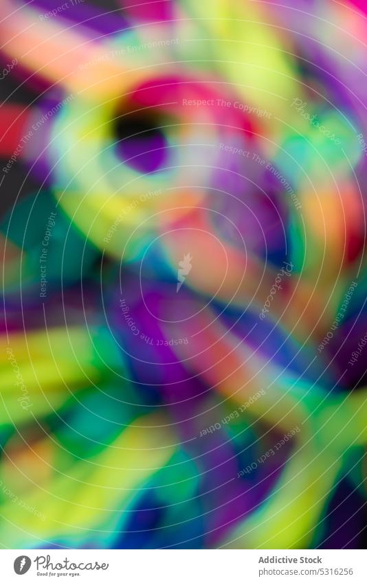 Blurred multicolored lines in background vibrant blur abstract creative spectrum bright design style colorful art mess decoration element twine glow vivid loose