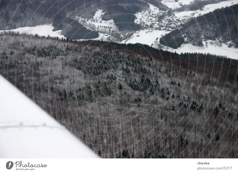 Winter landscape from the air Forest Village Aerial photograph Aviation Snow