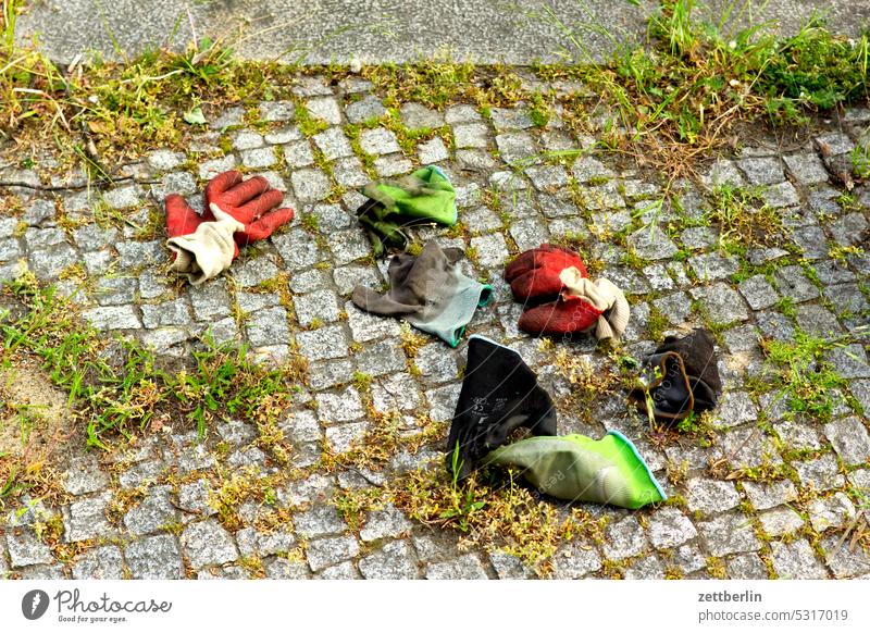 gloves waste Work gloves Occupational health and safety variegated Sidewalk Colour found rubber gloves Gloves Lie Trash pavement assortment Doomed variety