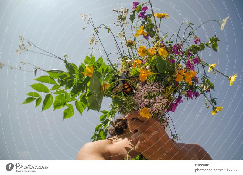 photo a bout a person holding a bokeh of flowers covering his face Summer Flower Nature Outdoors youthful bunch pretty Arm bouquet white floral bloom elegance