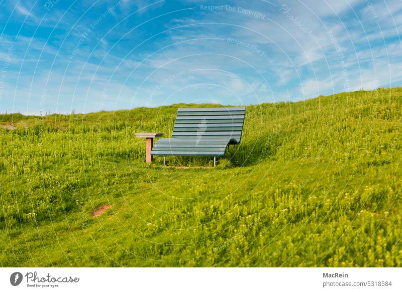 Park bench on a green field nobody Deserted Sky Clouds